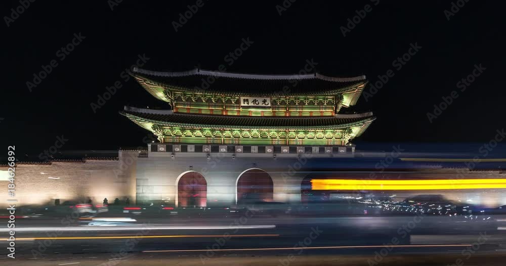 Time lapse clip of traffic at Gwanghwamun gate at Gyeongbokgung palace in Seoul.