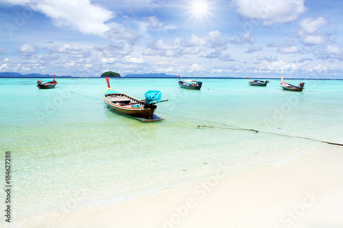 Beach at the blue sea sunny day