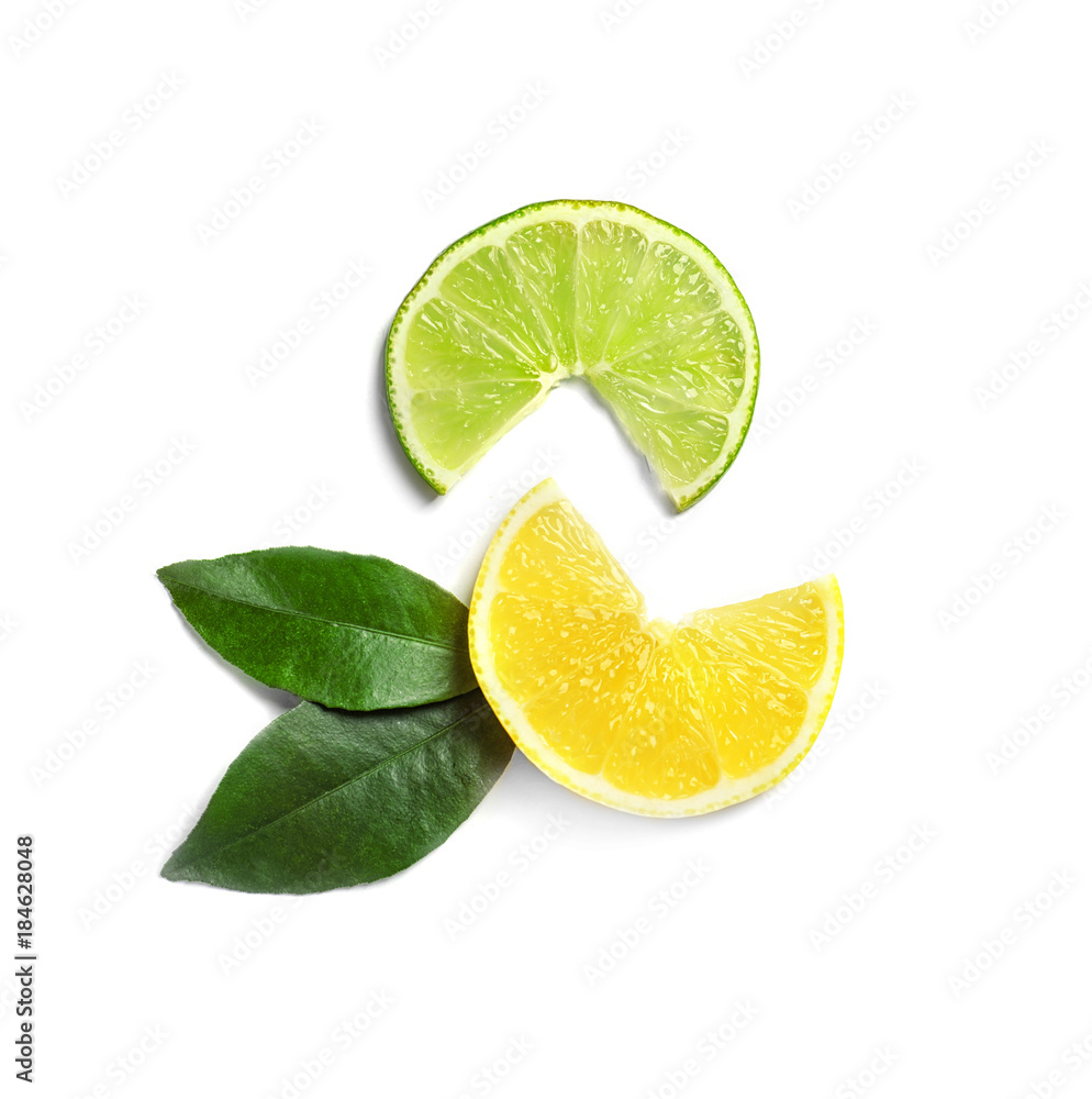 Composition with lemon and lime slices on white background