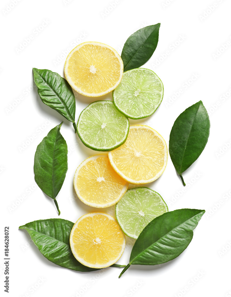 Composition with lemon and lime slices on white background