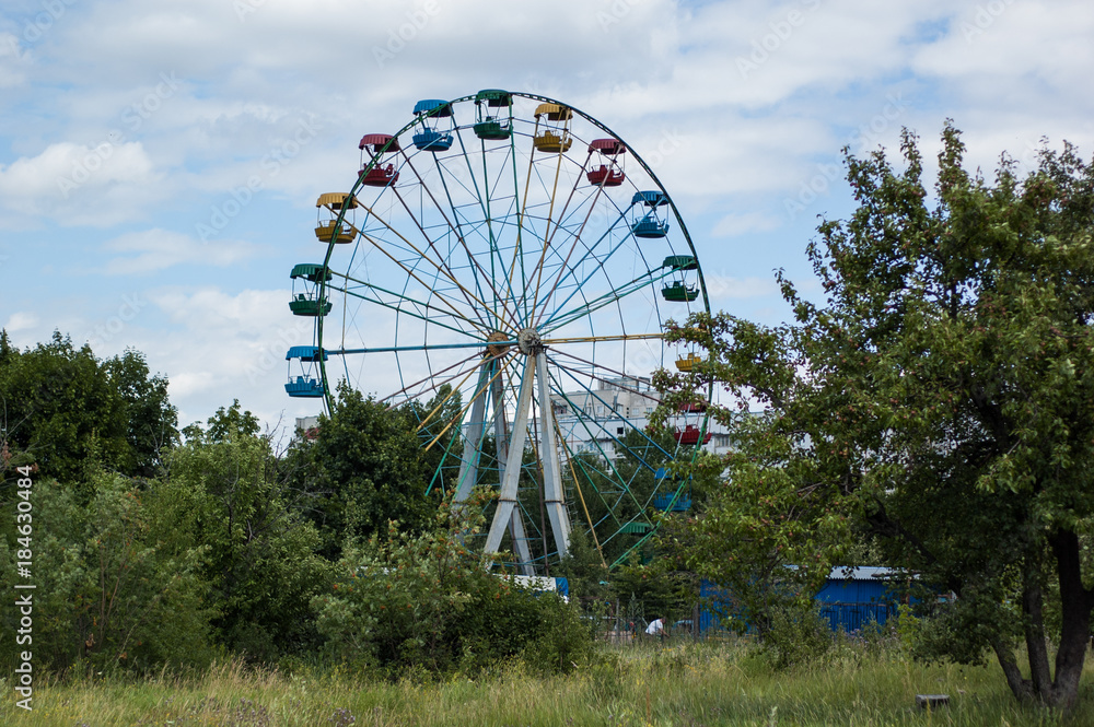 A small wheel of view in the park.
