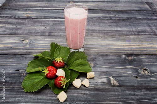 Glasses of fresh cold smoothie with fruit and berries
