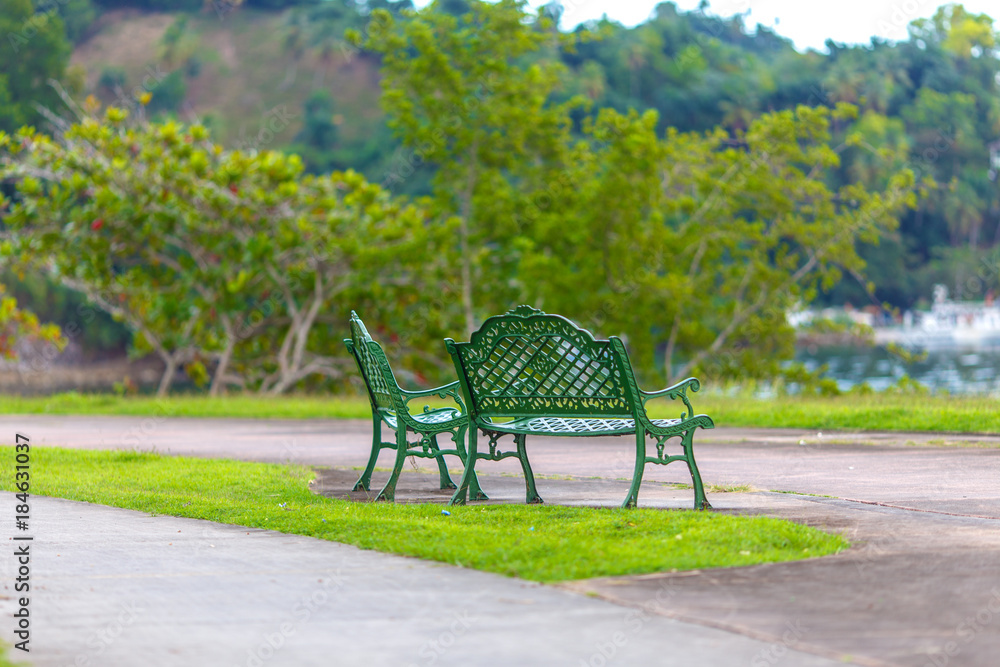 green benches in the Park