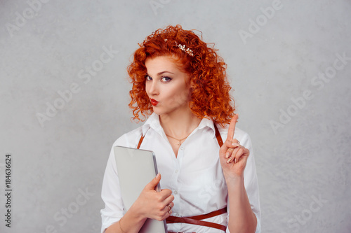 woman gesturing a no sign. Closeup portrait unhappy, serious red head retro style girl raising wagging finger up saying oh no you did not do that do not touch my laptop isolated on gray background