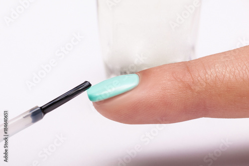 Manicure. Master make nail extension. Finger closeup