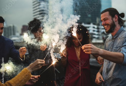 Group of friends having a party photo