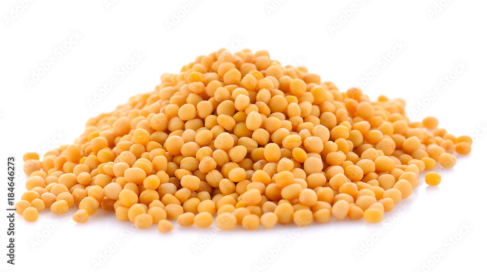 mustard seeds on white background