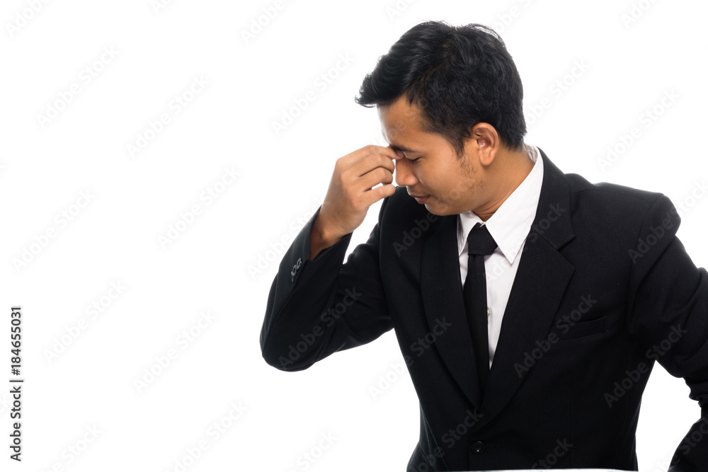 Portrait of a business man having a headache. Isolated on white background Portrait of a business man having a headache. Isolated on white background