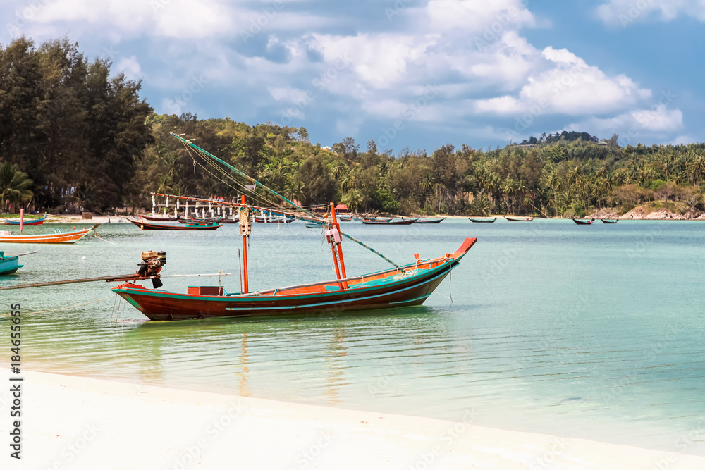 Fisherman boat parked at Thong Nai Pan Yai beach, Paradise, Malibu or Bottle beach in Chaloklum, Koh Phangan, Thailand