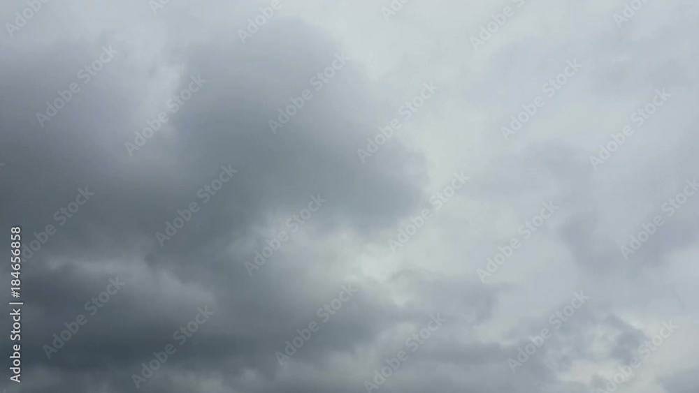 Time lapse dark rainy clouds over blue sky Time lapse dark rainy clouds over blue sky