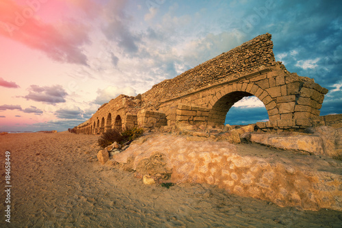 Fototapeta Old Aqueduct on the beach  in Caesarea, Israel
