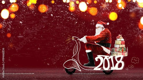 Santa Claus on scooter delivering Christmas or New Year gifts at snowy red background