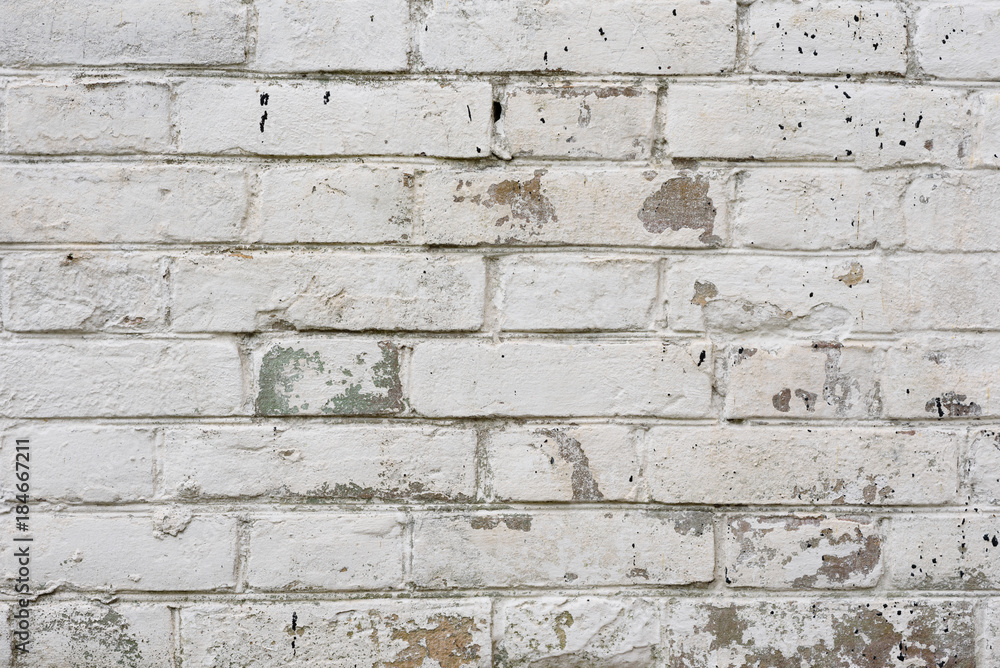 Fototapeta premium Brick texture with scratches and cracks