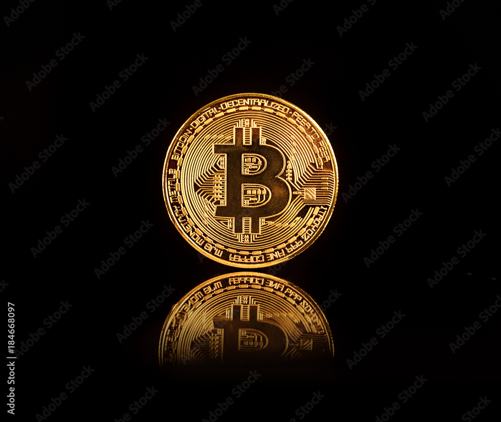 Bitcoin BTC the new virtual internet Cryptocurrency isolated on black background. Bitcoin BTC the new virtual internet Cryptocurrency isolated on black background.
