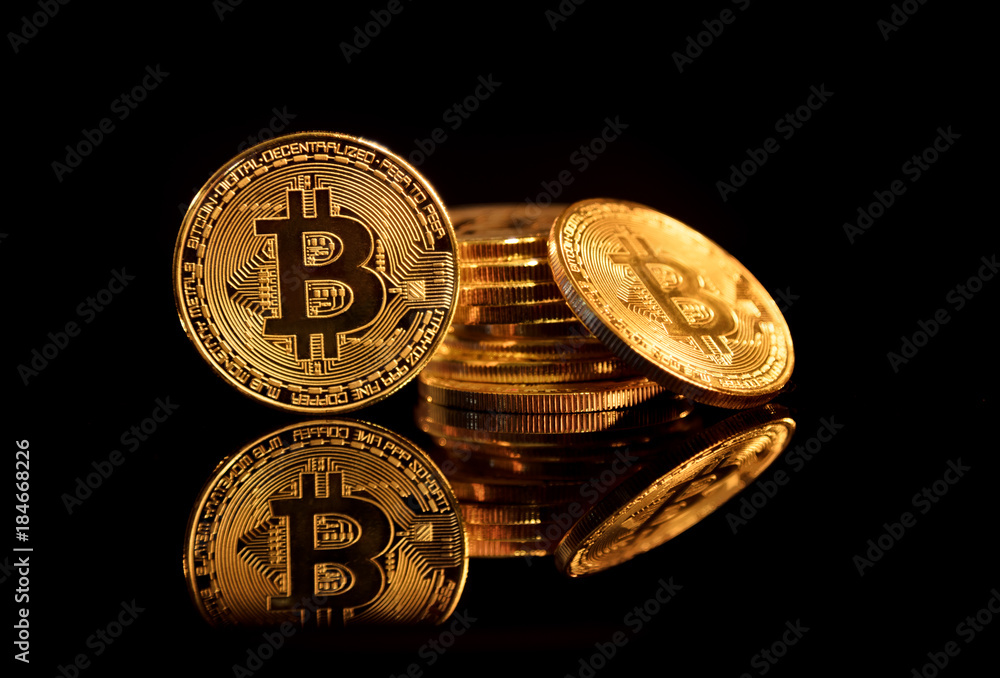 Bitcoin BTC the new virtual internet Cryptocurrency isolated on black background. Bitcoin BTC the new virtual internet Cryptocurrency isolated on black background.