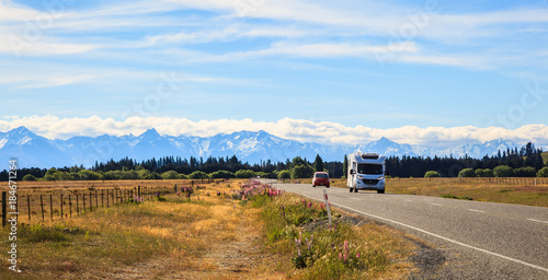 Family vacation trip, leisurely travel in motor home, Happy Holiday Vacation in Caravan camping car. Beautiful Nature New Zealand natural landscape Scenic route with camper van in New Zealand.