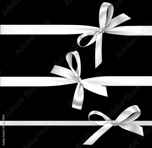 Vector set of silver bow with ribbon isolated on black background. 