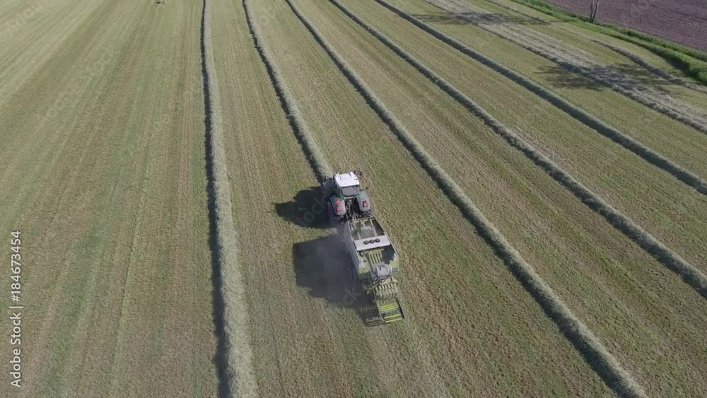 aerial hay field production overview rising reveal angle 4k aerial hay field production overview rising reveal angle 4k