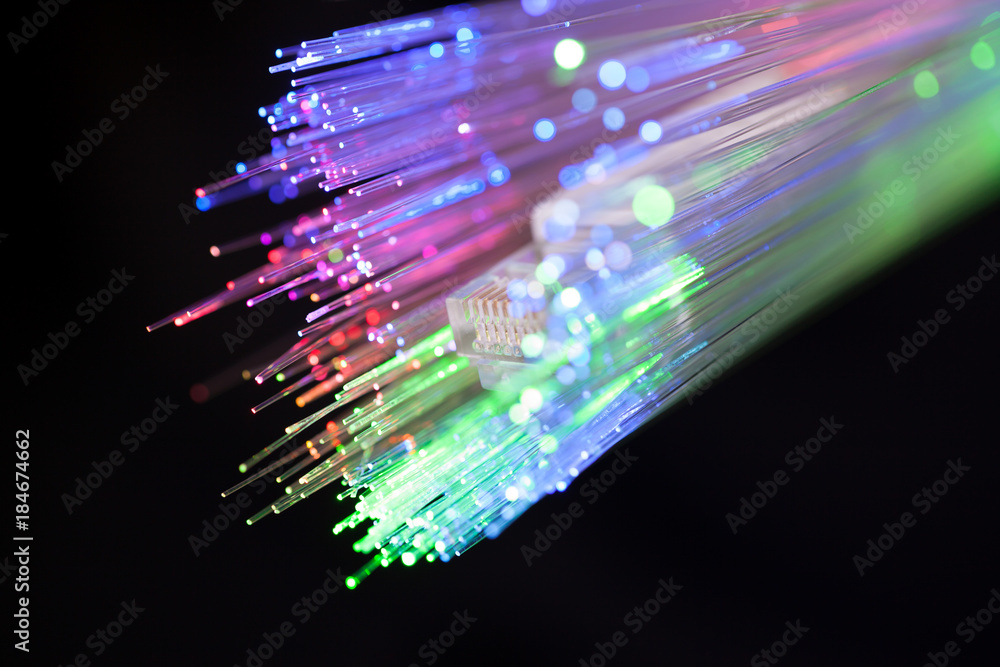 Close up studio shot of optical fiber cable in the darkness