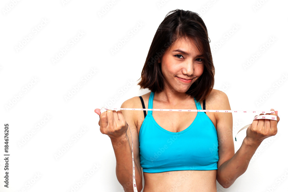 woman diet background fitness concept happy weight loss beautiful body calories healthy care closeup blue sports bar and hand using white measurement tape on white woman diet background fitness concept happy weight loss beautiful body calories healthy care closeup blue sports bar and hand using white measurement tape on white