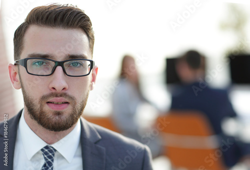 closeup.Executive businessman on background of office.