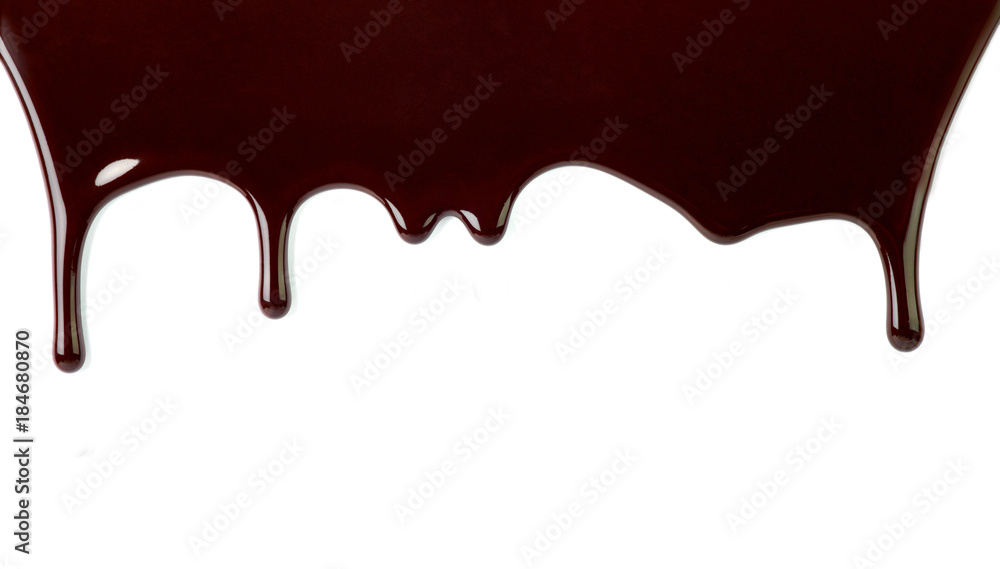 close up of chocolate syrup leaking on white background close up of chocolate syrup leaking on white background
