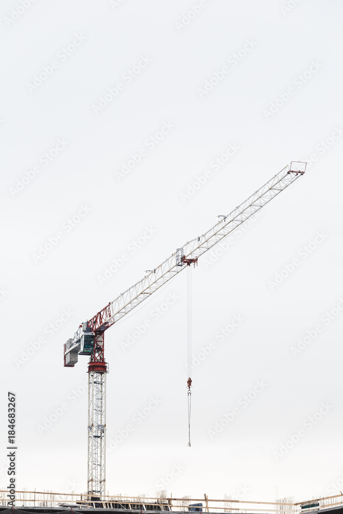 Crane is used in the construction of buildings. Crane is used in the construction of buildings.