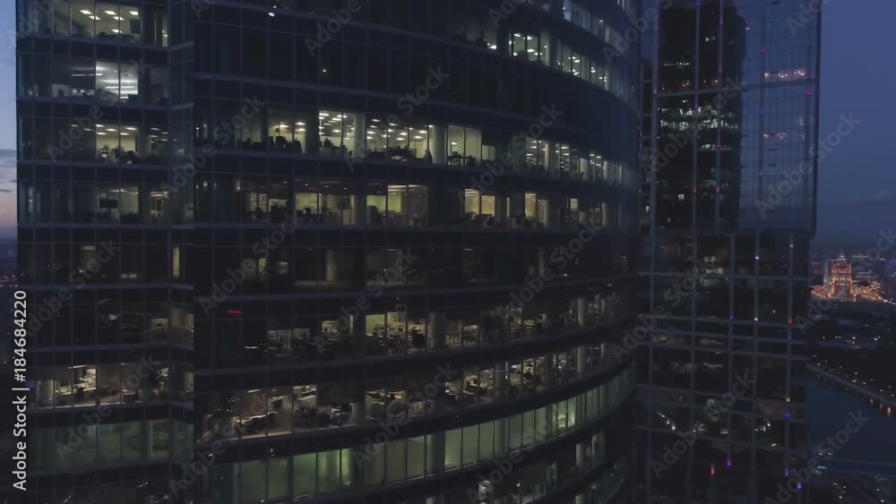A night drone Aerial shot of skyscrapers of business centre city, 4K Ultra HD real time video. Urban scene of consulting company office. Camera moving around building. Moscow skyline A night drone Aerial shot of skyscrapers of business centre city, 4K Ultra HD real time video. Urban scene of consulting company office. Camera moving around building. Moscow skyline