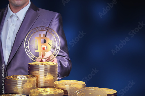 Virtual cryptocurrency concept with golden coins of bitcoin