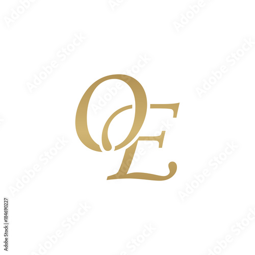 Initial letter OE, overlapping elegant monogram logo, luxury golden color photo