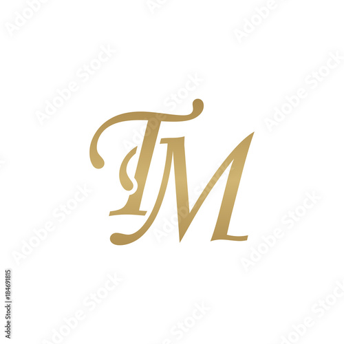 Initial letter TM, overlapping elegant monogram logo, luxury golden color