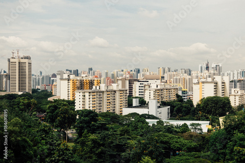 Modern city and green forest in spring day © NIPATHORN