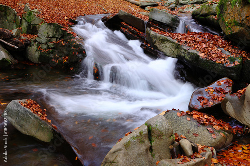 Waterfall in the autumn beech forest