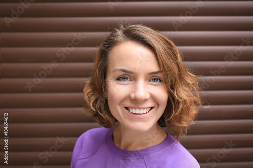 Beautiful smiling woman nea...