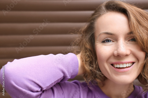 Beautiful smiling woman nea...
