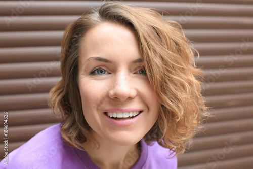 Beautiful smiling woman nea...