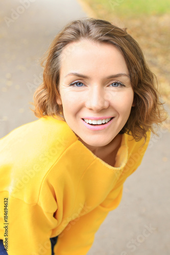 Beautiful smiling woman in ...
