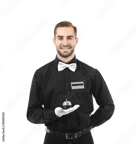 Tapeta Handsome bellboy on white background