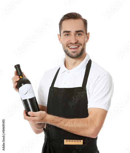 Handsome waiter with bottle...