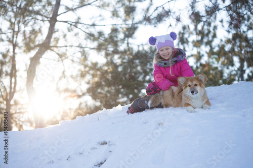 girl and corgi fluffy puppy portrait