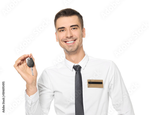 Attractive salesman holding...