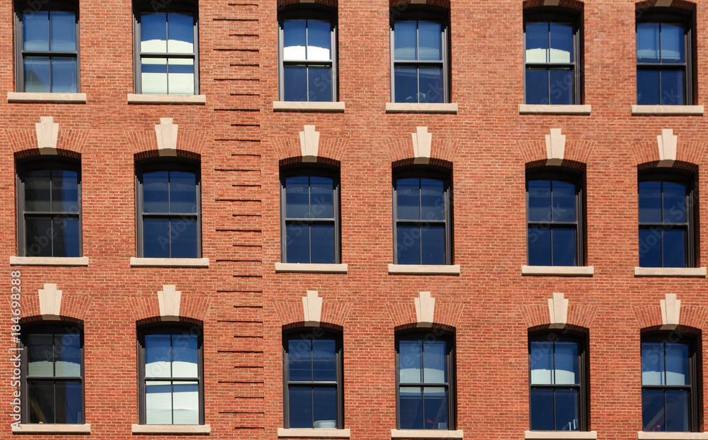 Archstones Over Windows in Traditional Brick Building