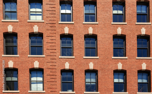 Archstones Over Windows in Traditional Brick Building