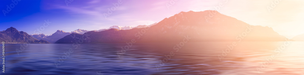 Panoramic beautiful lake and swiss alps mountain with blue sky