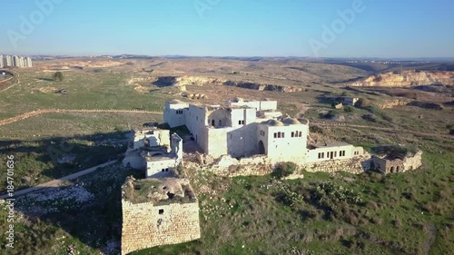 Aerial view of Ottoman era fortress ruins on top of mediterranean hill | 4k UHD