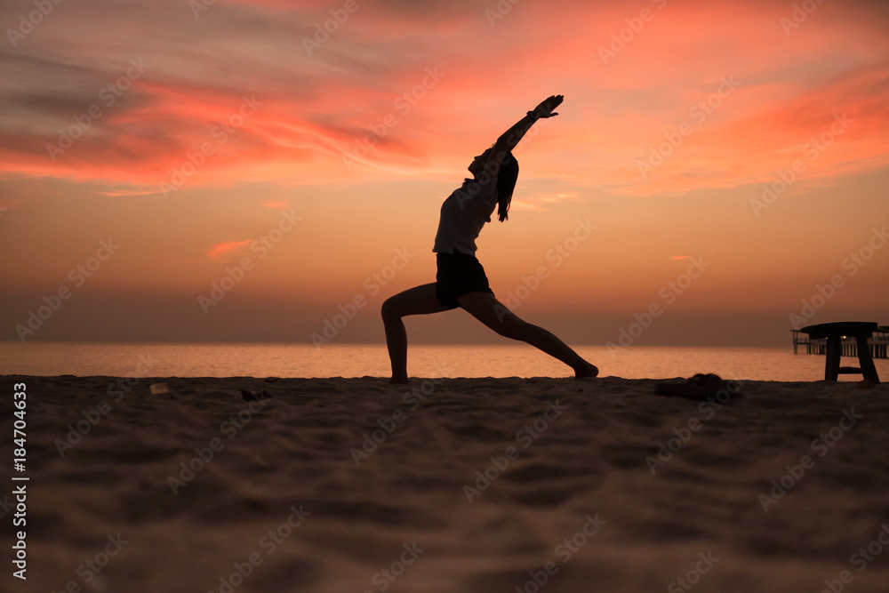 Yoga in the sunset beach