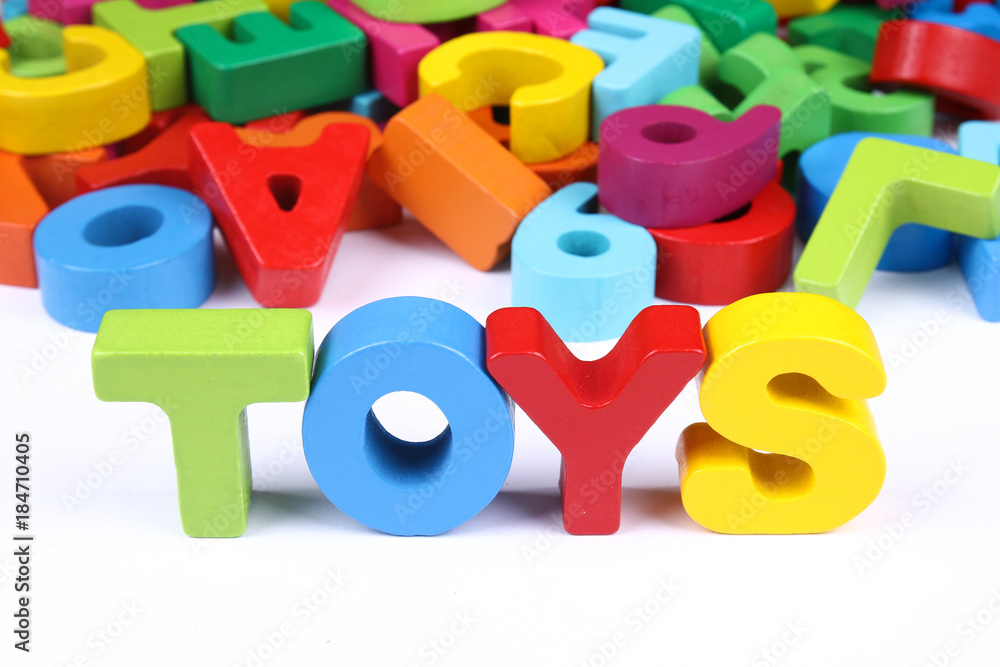 Obraz premium Colorful blocks of alphabets and numbers as toys for child development