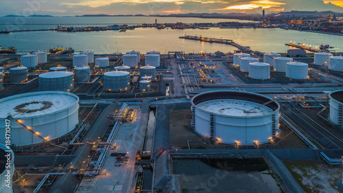 Aerial view oil terminal is industrial facility for storage of oil and petrochemical products ready for transport to further storage facilities. photo