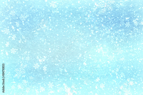 Blue Christmas background snow texture, abstraction, white snowflakes. Christmas background, winter Wonderland