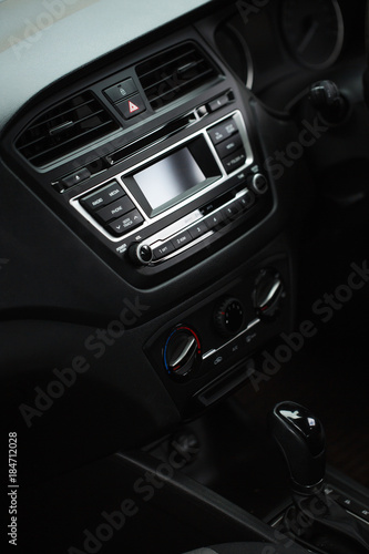 Interior view of car with black interior through the glass.